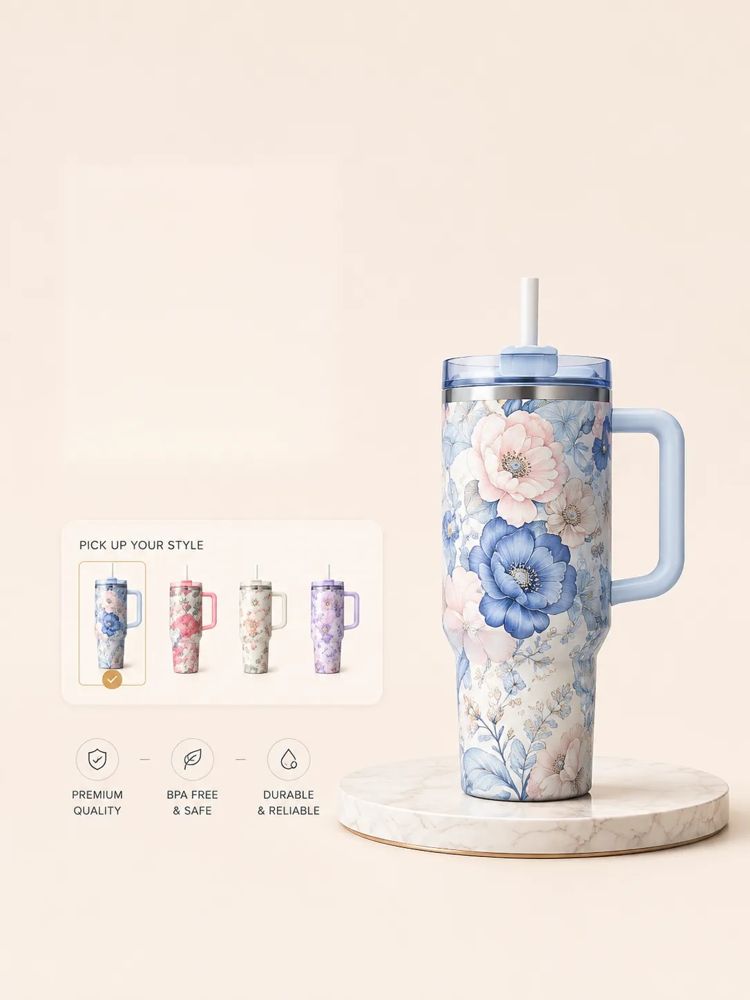 Four floral handle tumbler styles with one selected beside a large blue floral tumbler on a display platform